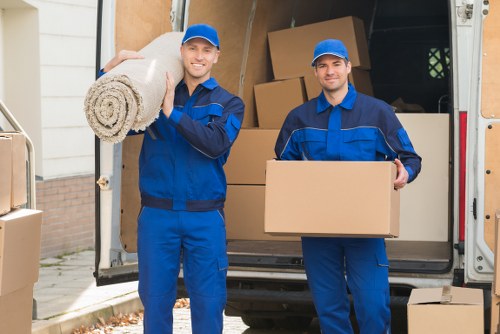 Careful loading of household items during a Finsbury Park flat removal