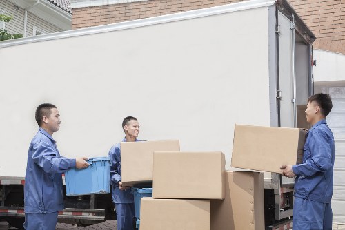 Professional movers handling items in a flat move near Finsbury Park
