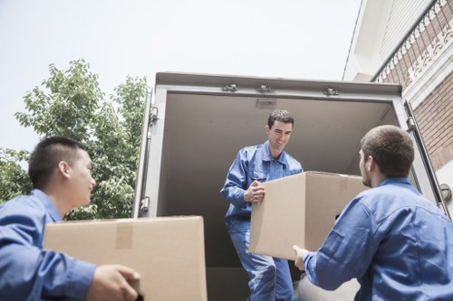 Packed boxes and furniture ready for a flat move in a North London apartment