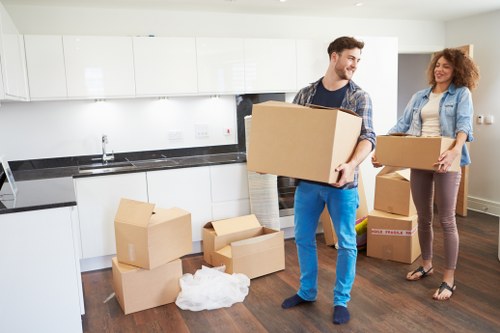 Local piano movers preparing a grand piano for safe relocation