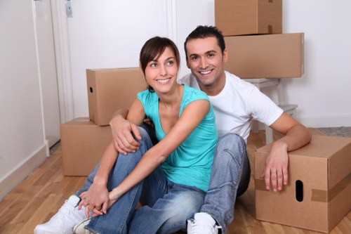 Packed moving boxes and furniture ready for transport in Finsbury Park