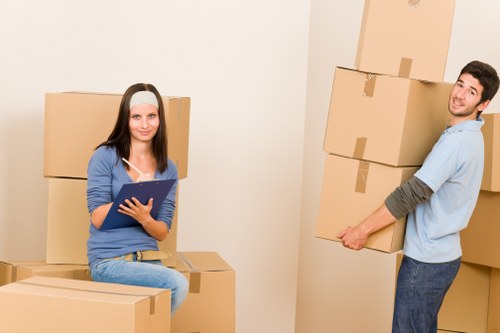 A professional packing team preparing boxes for relocation